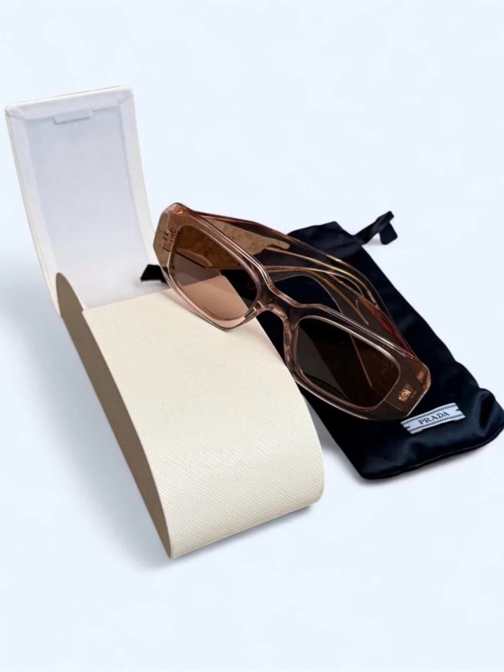 Prada Women’s Transparent Light Pink Rectangular Sunglasses